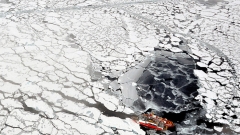 (two ships in the Arctic Ocean on a survey to map the region’s continental shelf