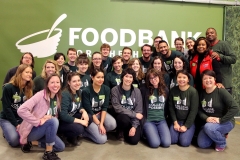 Angela Luedke with a large group of team members during her AmeriCorps service with College Possible