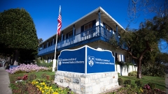 Building on the Middlebury Institute campus, CNS building (499 Van Buren), with the US flag outside of it