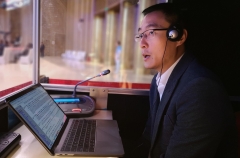 Student in an interpretation booth