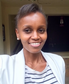 Headshot of Mary Njuguna smiling