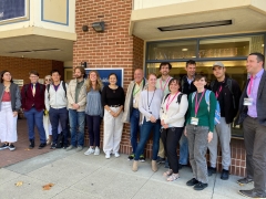 MIIS students standing with Vladimir Pozner outside of MG100