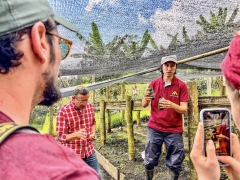 a group of students discussing coffee in rural Colombia