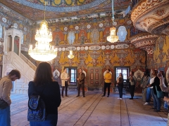 students on a guided tour of the painted mosque in Macedonia