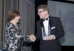 Mary Ann Leffel with Jeff Dayton Johnson and Award