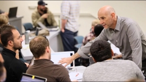 Fernando DePaolis talking to students in a class