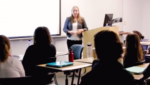 A student makes a presentation to her class.