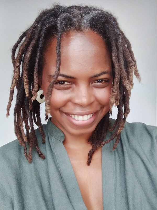 Headshot, Miss Veta N. Wade smiling and with kind eyes