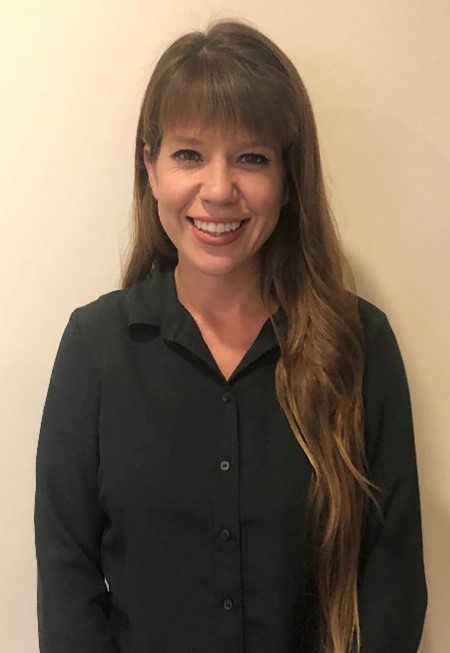 Mrs. Nereyda (Rey) Harmon, Senior Planner, County of Santa Barbara’s Planning & Development Department, smiling brightly with long hair and a black blouse