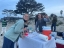 Nick Gil manning the table for the beach bonfire at Del Monte Beach,