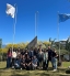 a group of students posing with flags in Costa Rica