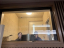 Two students in an interpretation booth