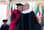 Senator Bill Monning receiving his honorary degree from Hannah Ross