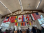 international flags hanging from rafters