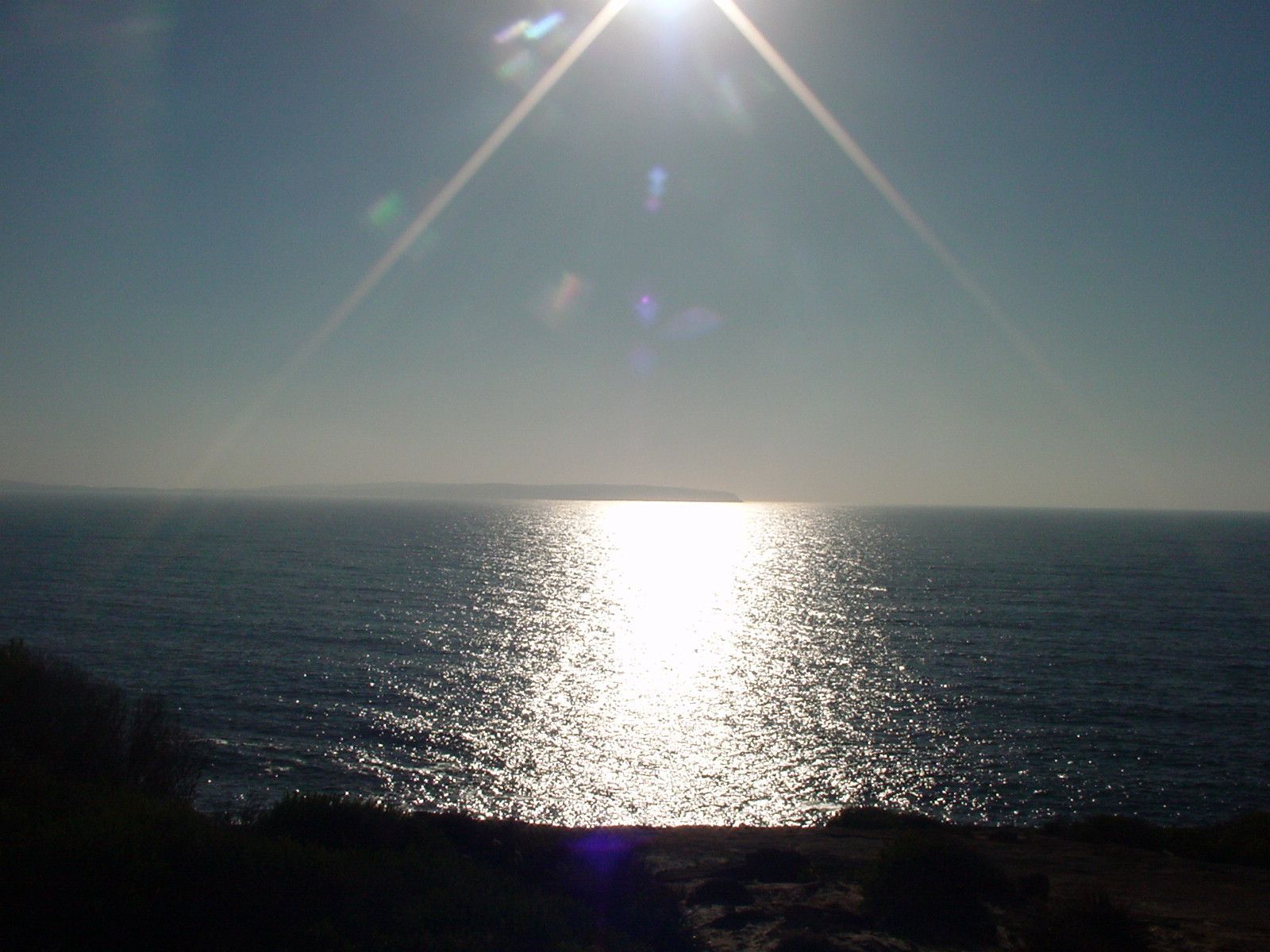 Sun shining over the ocean-expansive