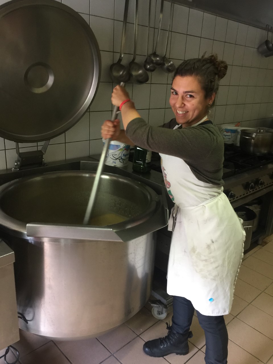 Sarah Horowitz, IPSS student stirring a pot