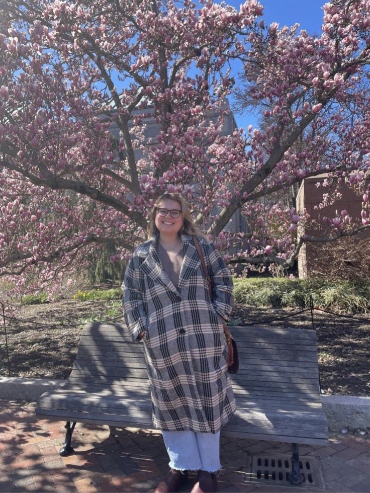 Samantha Fino, MIIS student, next to a tree
