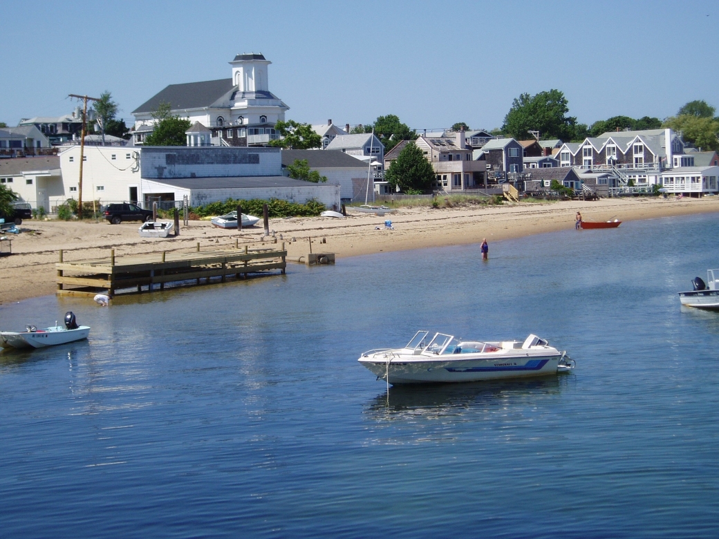 Cape Cod landscape showing shoreline, houses, boats
