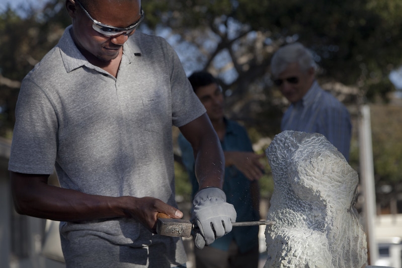 Moses Nyanhongo demonstrates stone sculpture creating