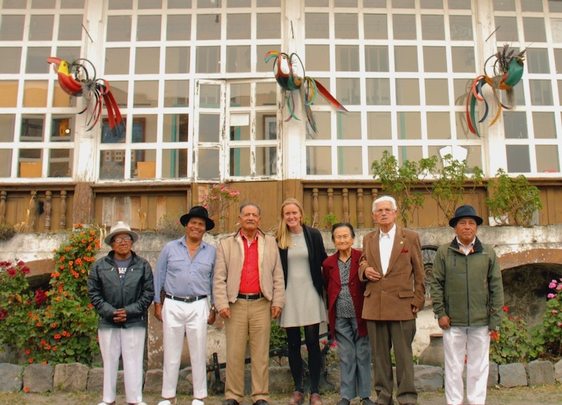 People standing outside building in Ecuador