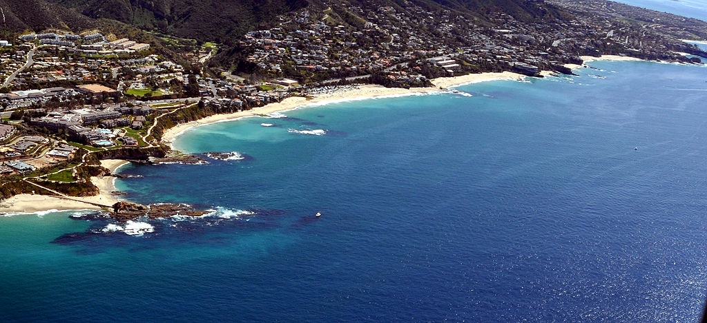 North Laguna Beach, California, aerial photo showing the densely populated coast and turquoise waters lapping white sand beaches