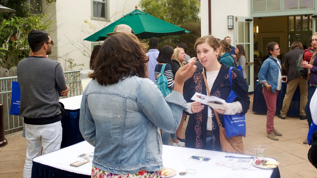 Student learning about clubs and organizations at preview days