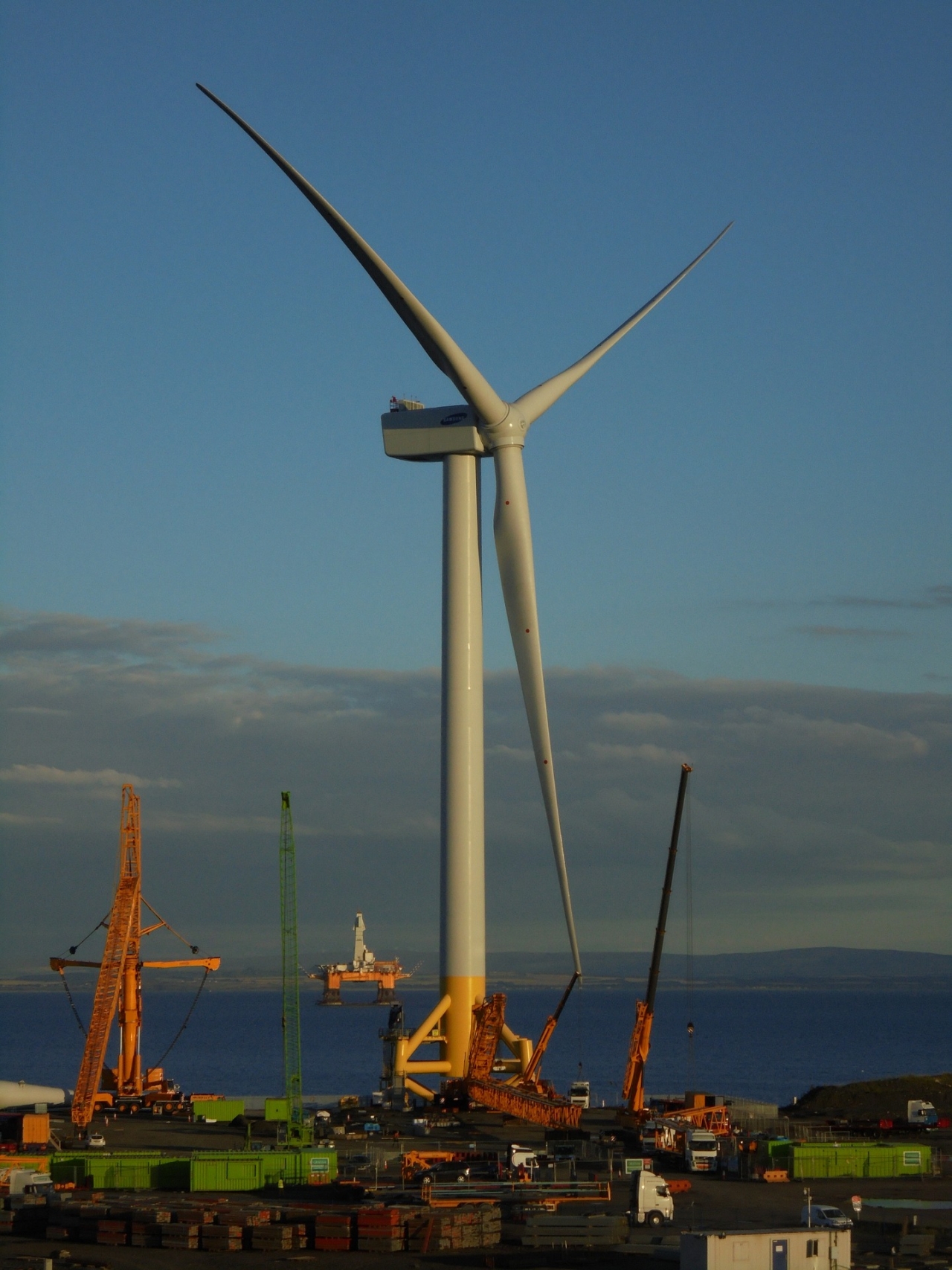 Gigantic Wind Turbine in a port setting
