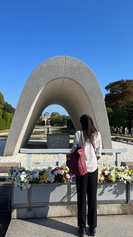 Halle Shephard stops to reflect at the ICAN Academy participants visited the Hiroshima Peace Memorial Museum and Park