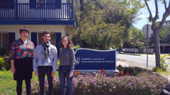 Three winners outside in front of the CNS MIIS sign