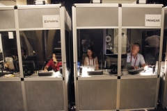  interpreters work in their booths during a Chef de Mission Seminar hosted by The Tokyo Organizing Committee of the Olympic and Paralympic Games, in Tokyo