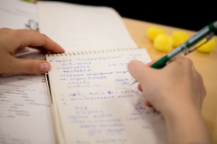 Notebook and hand writing in Russian