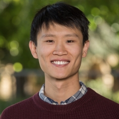 Derek Ouyang smiling brightly with warm eyes, short black hair, and plaid shirt under burgandy sweater https://city.systems/https://city.systems/https://city.systems/https://city.systems/https://city.systems/https://city.systems/https://city.systems/https://city.systems/cici
