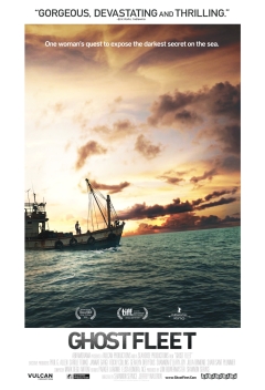 Film poster with an ominous rusty fishing vessle, a man silohuetted on deck, the sun setting pale pink and orange behind, blue and dark ocean waters below