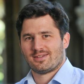 headshot of Andreas Kuehn