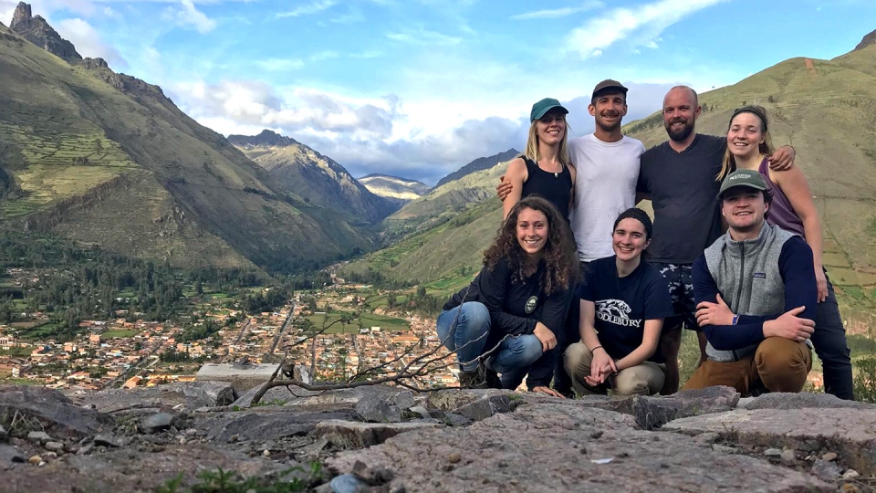A group of students pose together in the mountains of Peru.