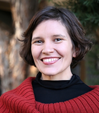 Image of Lacey Raak, young woman with big smile, brown hair, and wearing black turtleneck with red sweater.  Hosted by Center for the Blue Economy, part of Middlebury Institute of International Studies Hayward Sustainability Speaker Series.