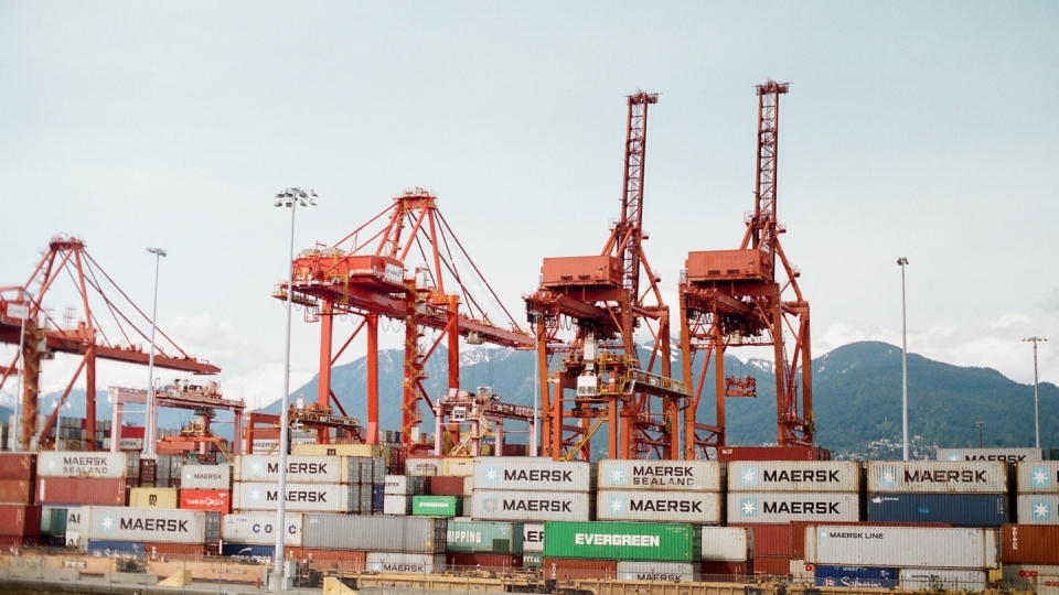 Cargo loading port with containers from Maersk and Evergreen
