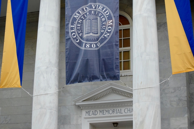 Front of Mead Chapel with Language School flag flying in front.