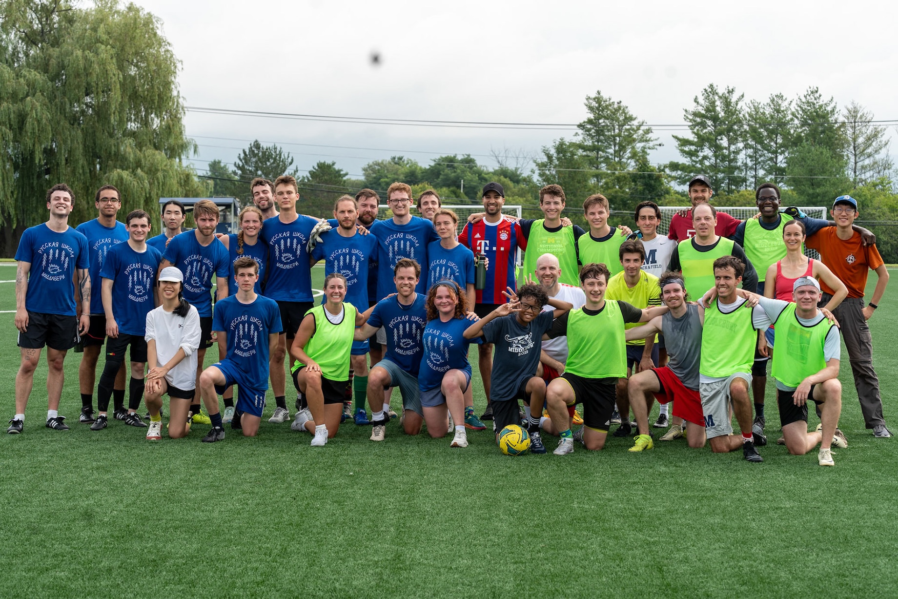 The School of Russian soccer team poses for a photo. 