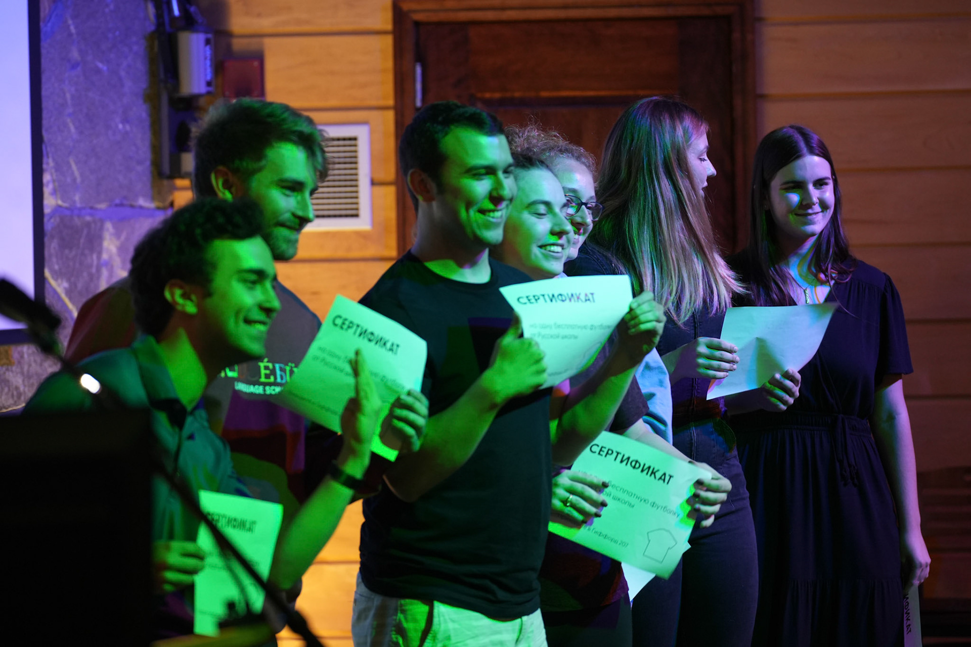 Students pose with their prize at trivia night. 