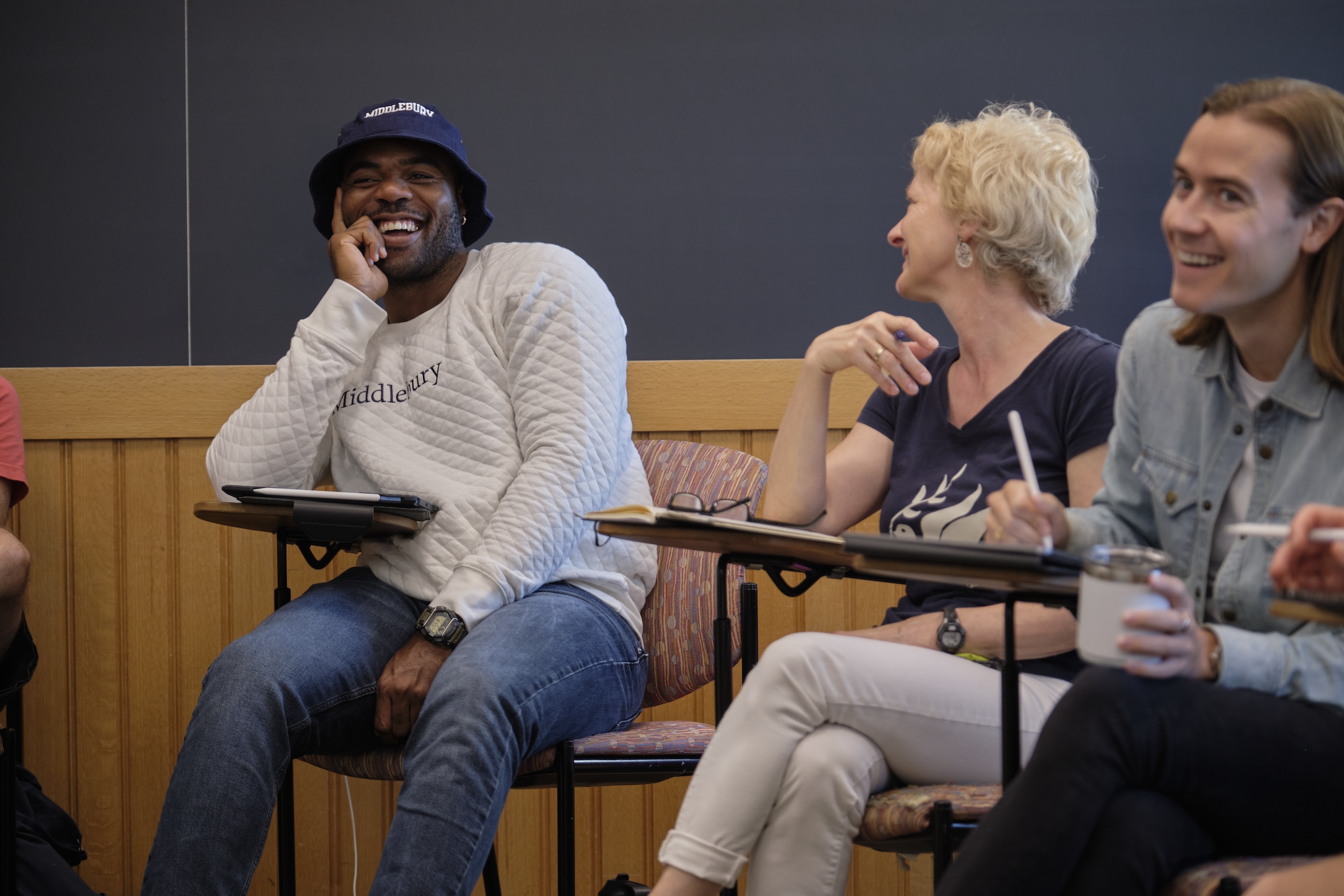 A group of students smiles in Chinese class. 