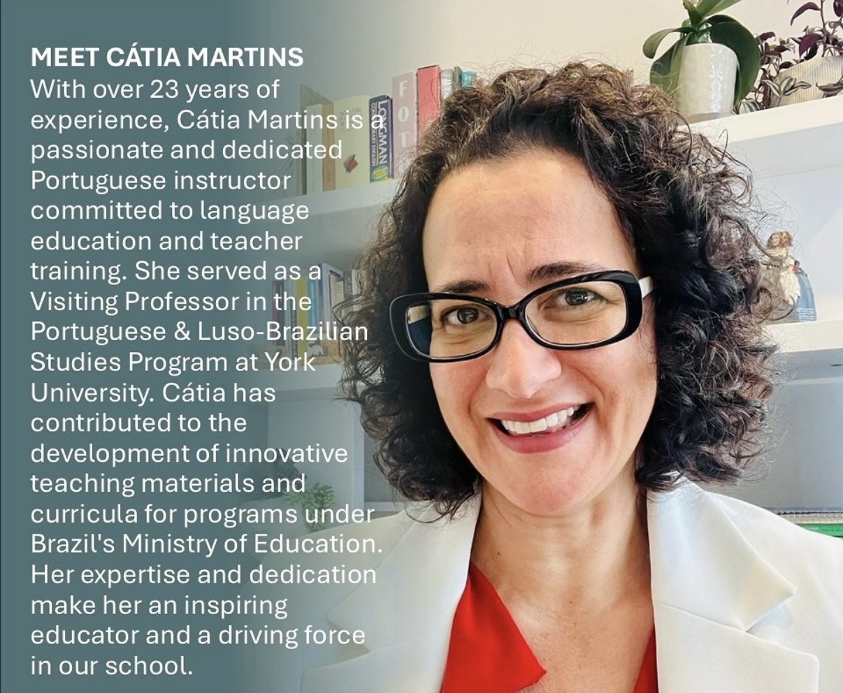 A woman in a red shirt, white jacket, and glasses smiles at the camera. 