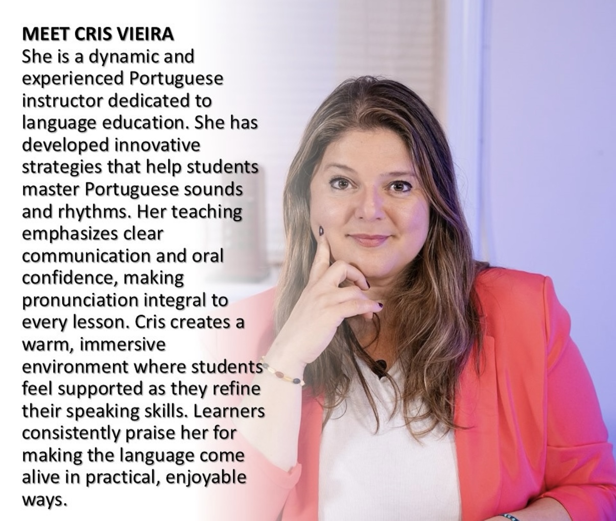 A woman in a pink jacket smiles at the camera. 