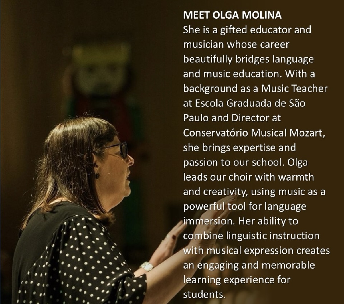 A woman conducts a choir. 