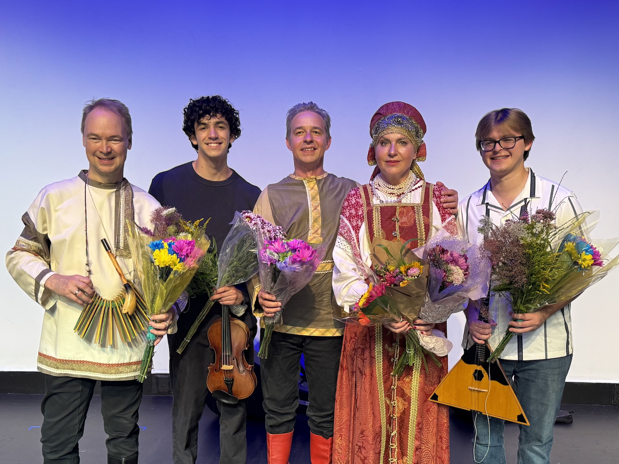 a group of students and professors at the School of Russian after a theater performance.