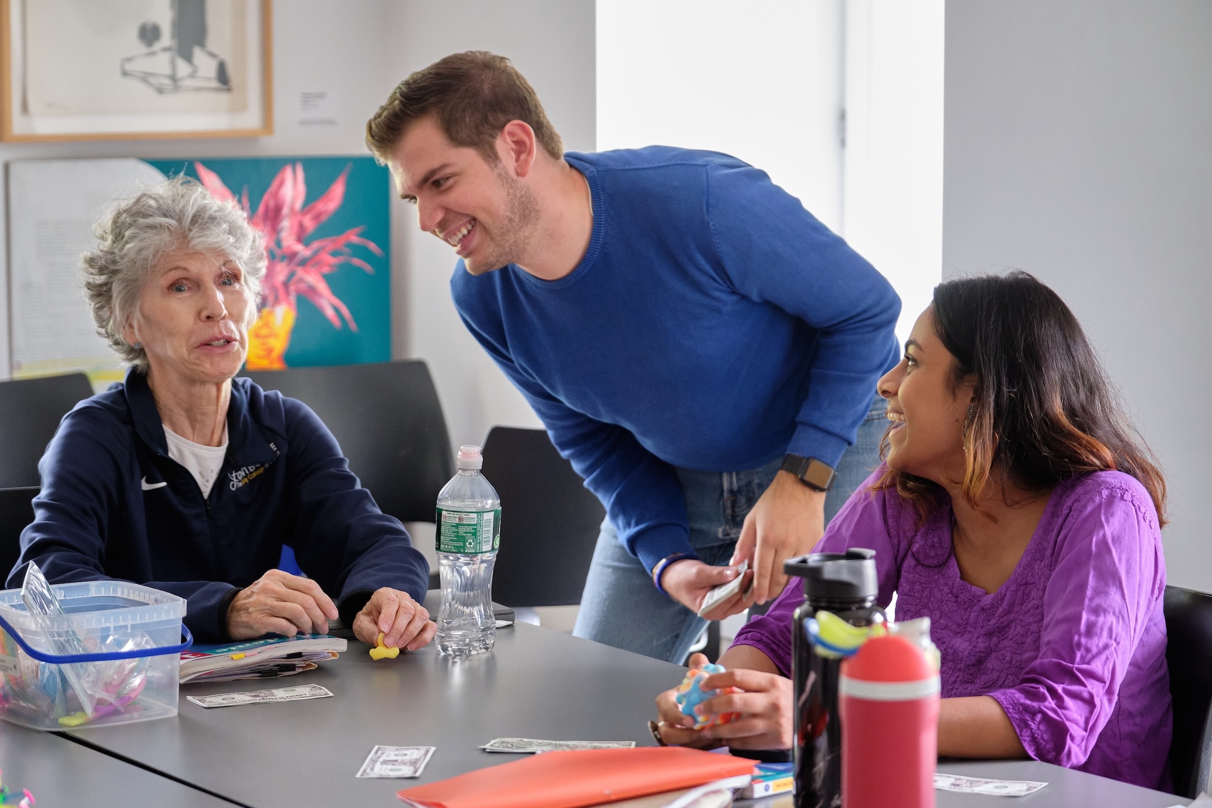 A professor works with his Italian 1 Students. 