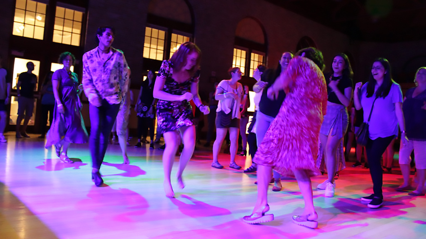 Students dance at a School of Spanish dance party. 