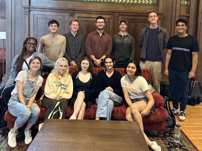 Ify with her classmates in the School of French in front of a picture.