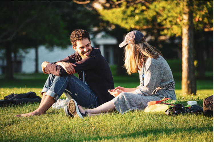 Language Schools students chat on the Middlebury College lawn