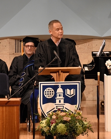 Edward Wong addresses the crowd at the 2024 commencement of the Middlebury Language Schools